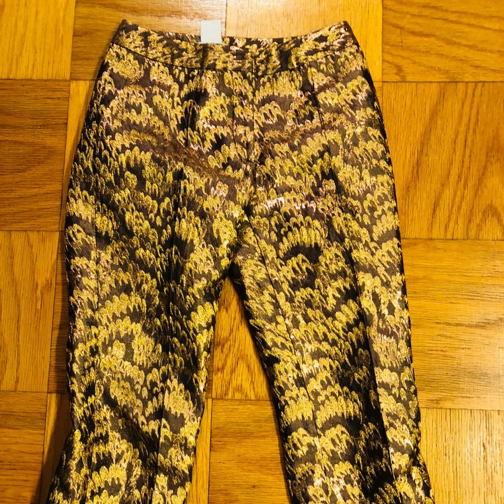 Dolce and Gabbana pants in gold. Size 40.